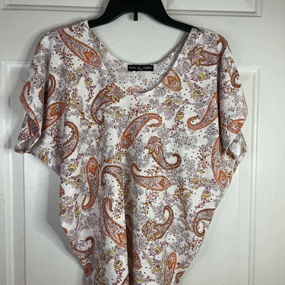 Kim & Cami short sleeve eyelet pattern top.